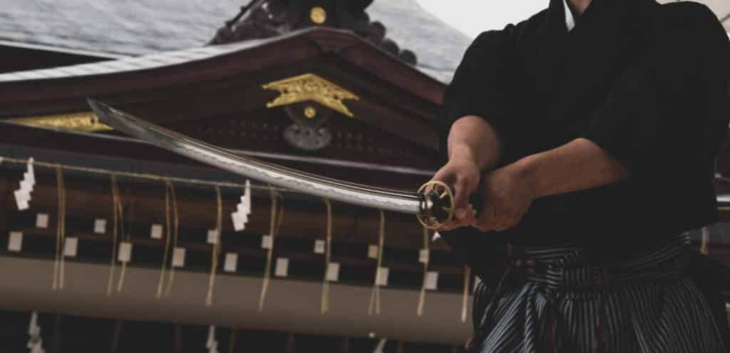 Samurai with Katana in front of temple