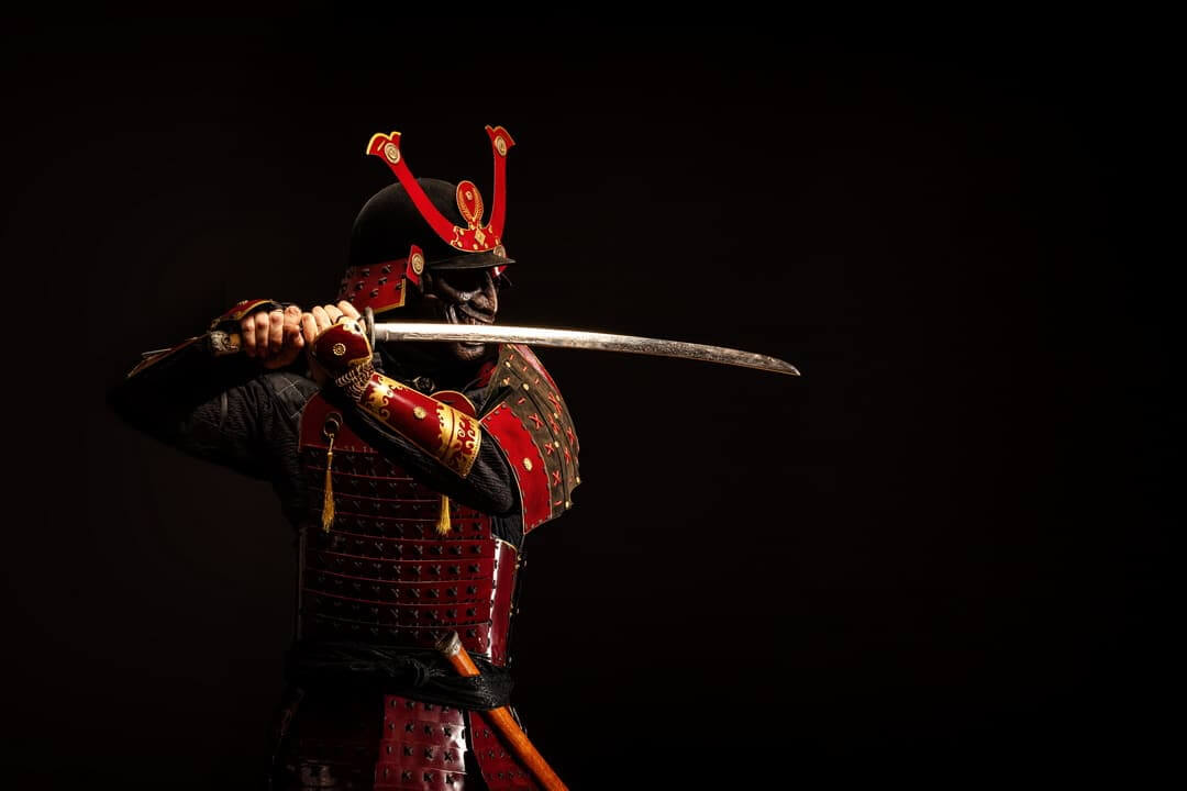 Man-Holding-Carbon-Steel-Katana